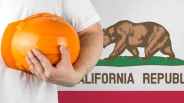 Worker with California flag on background for working