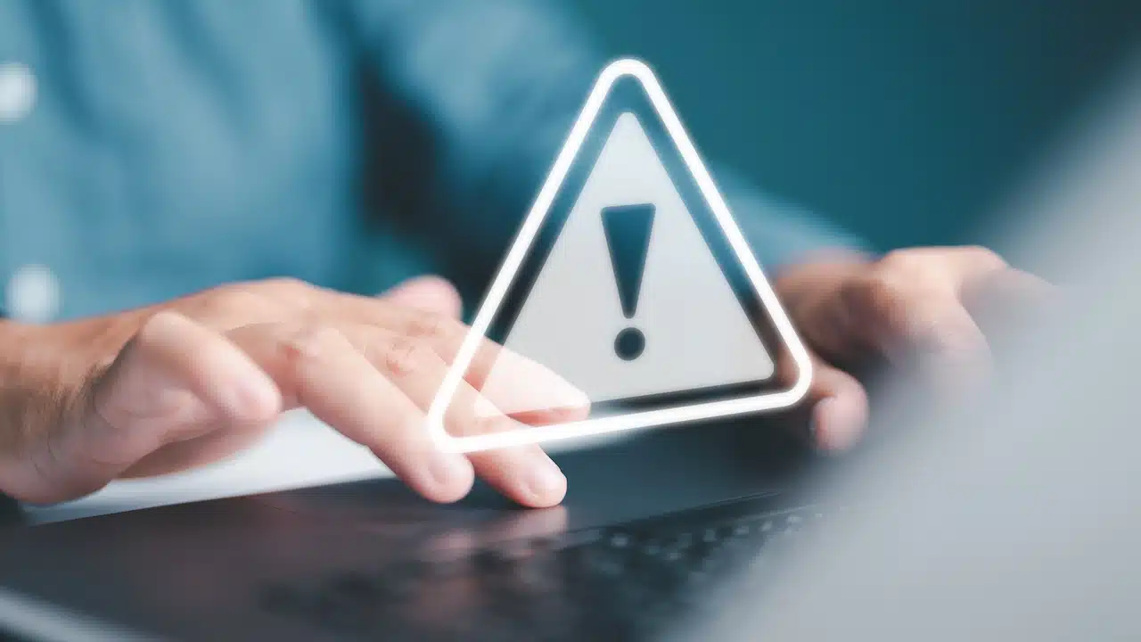 System warning on hacked alert, cyberattack in computer network.