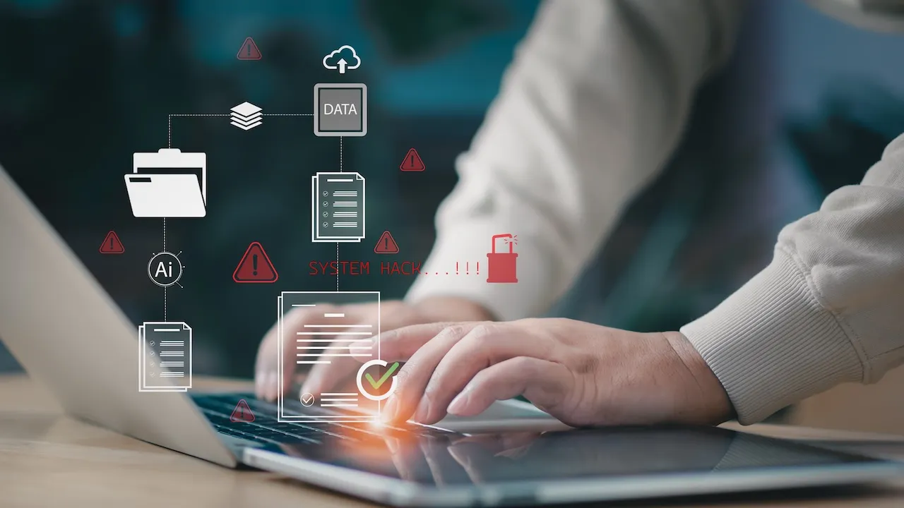 User typing on laptop cybersecurity warning, system detect digital data breach,