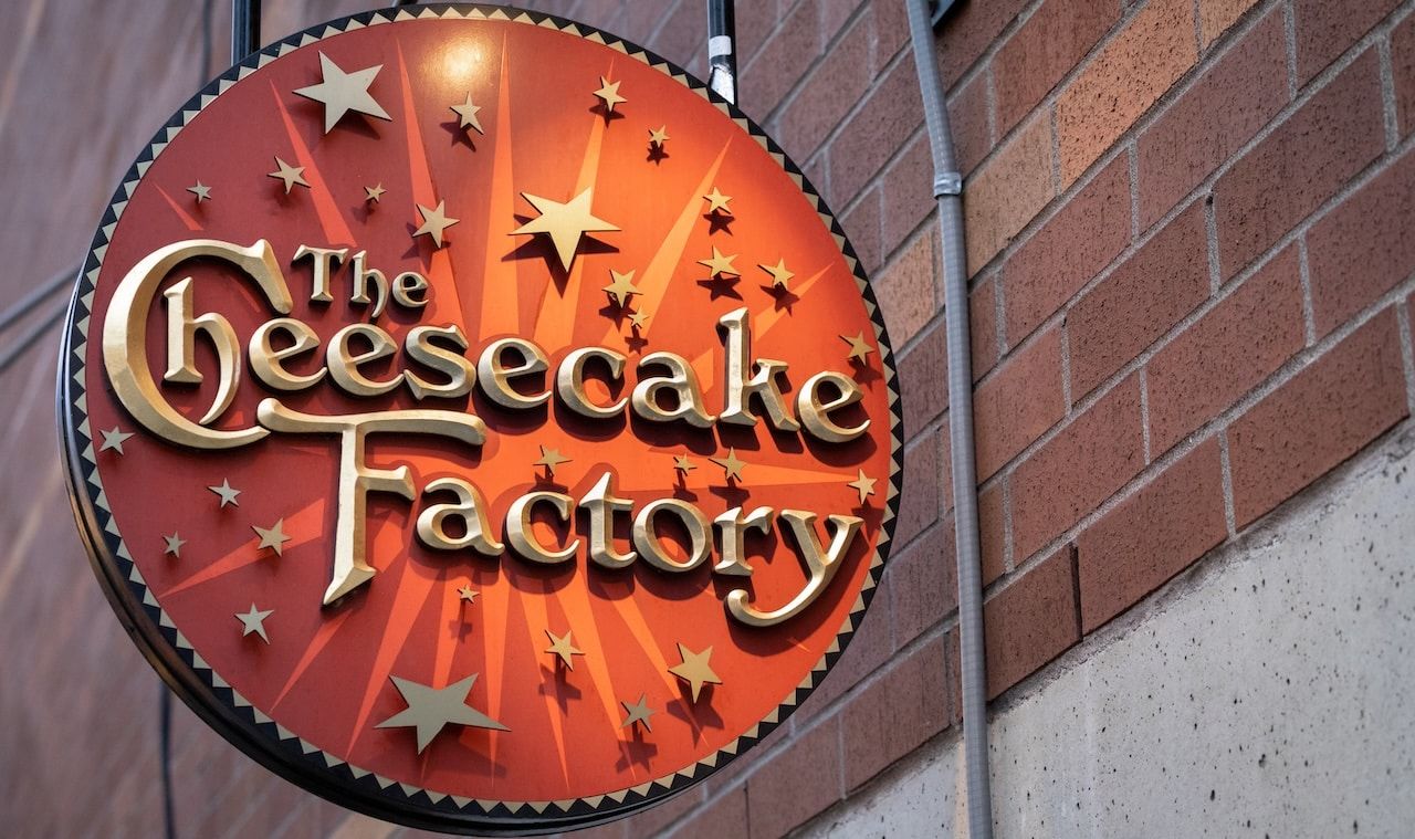 "The Cheesecake Factory" sign at the American restaurant company and distributor of cheesecakes,