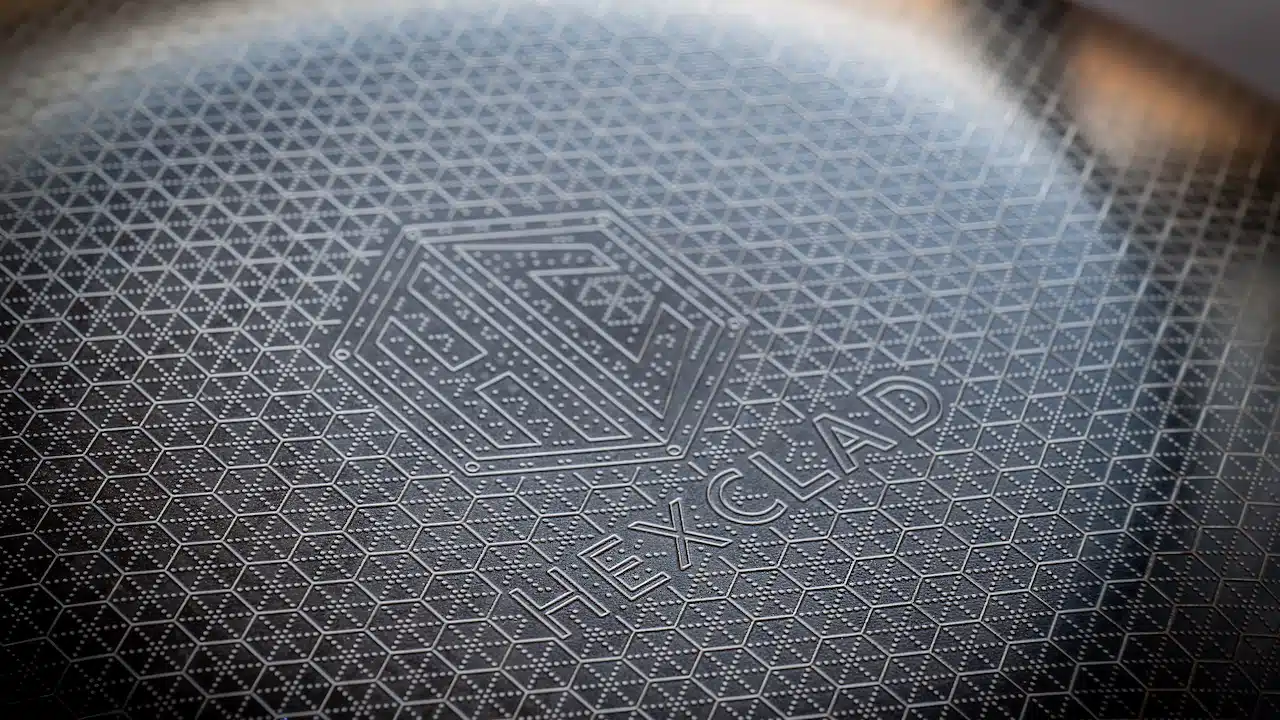 Selective focus on the textured surface of a Hexclad non-stick cooking pan.