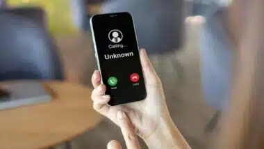 Woman receives a phone call from an unknown number,
