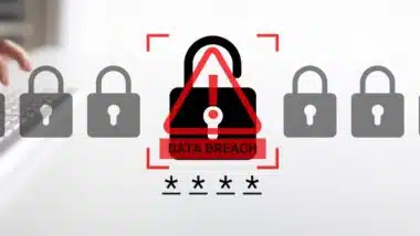 A modern cybersecurity concept highlighting a data breach warning alongside a computer keyboard