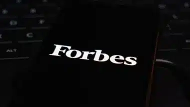 Forbes logo on smartphone