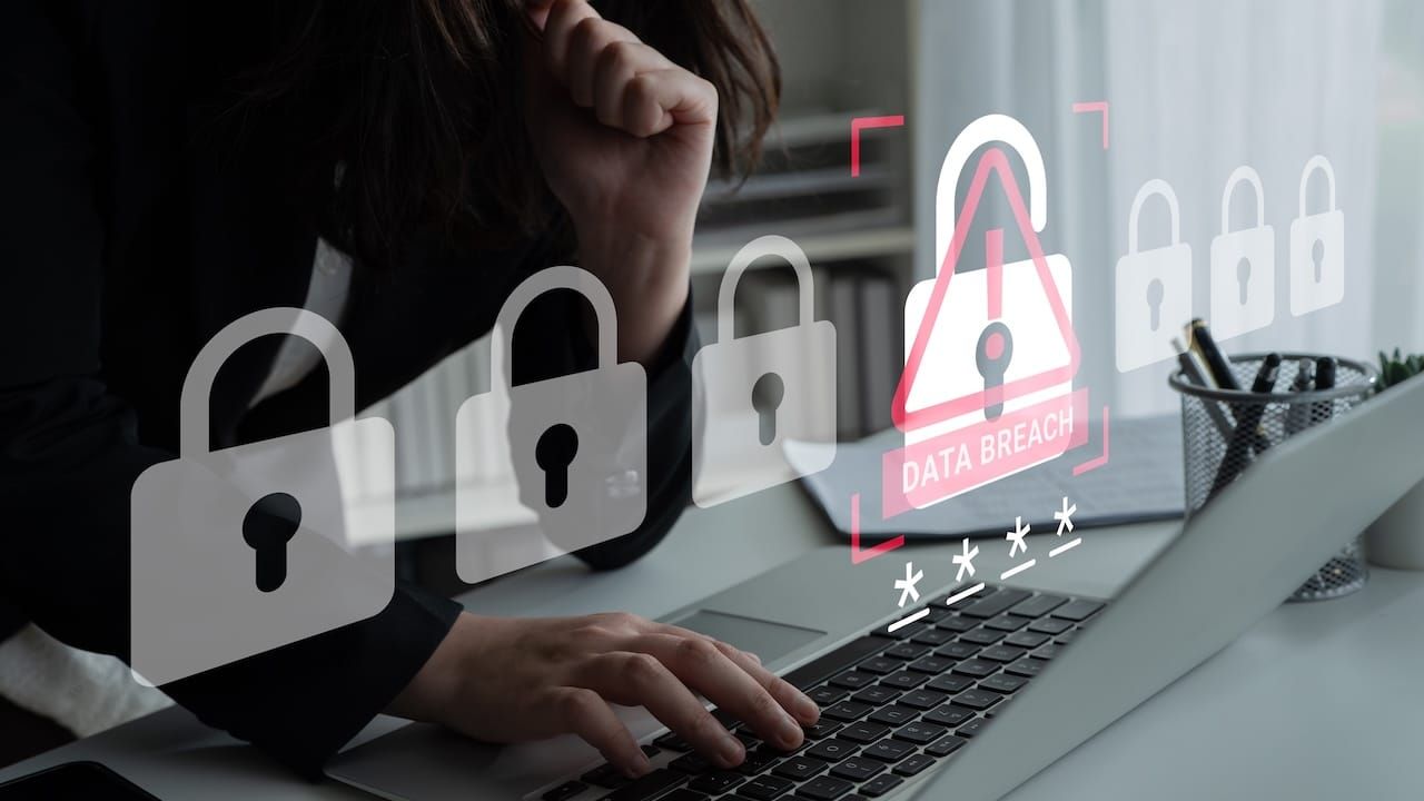 The image illustrates a woman working on a laptop with digital security icons, highlighting critical concerns about data breaches and the need for cybersecurity measures.