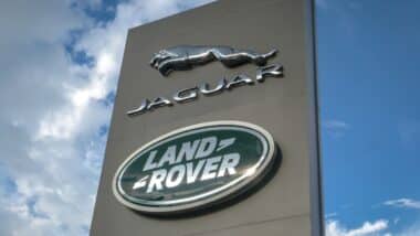 photo of jaguar land rover logo at a pillar or billboard or signboard near a jaguar land rover official dealer