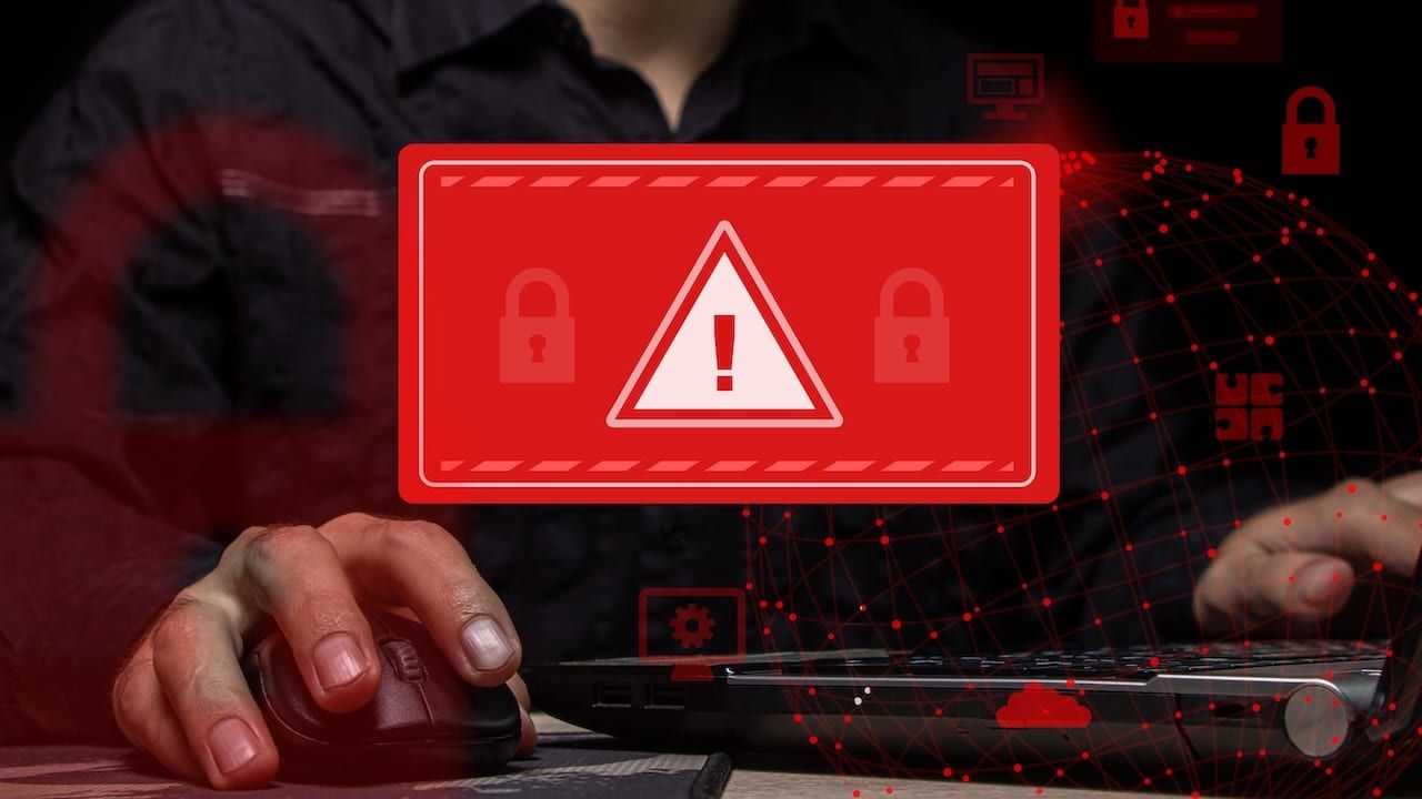 Computer system hack warning. The concept of a cyber attack on a computer network.