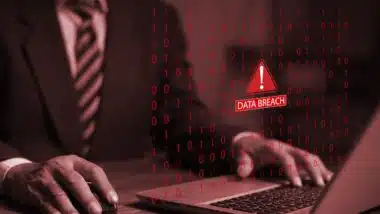 Businessman using laptop system hacked warning alert warning signs.