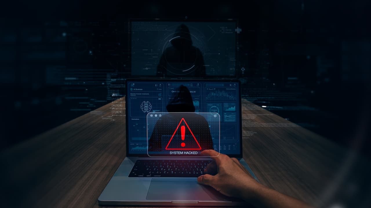 System hacked alert after cyber attack on computer network compromised information concept.