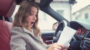 woman shocked at rental car fees