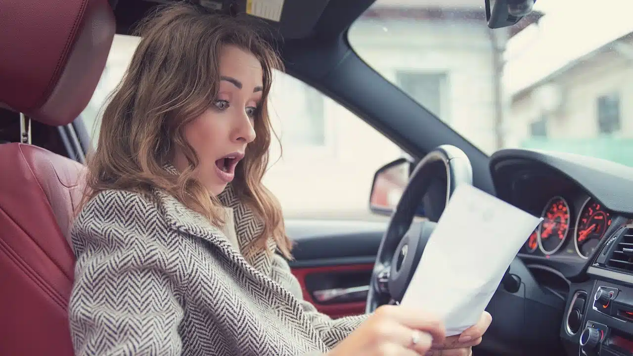 woman shocked at rental car fees