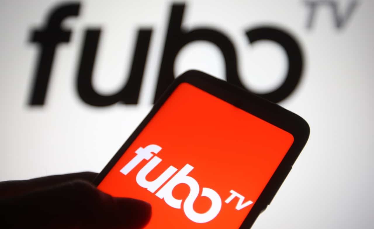 FuboTV logo is seen on a mobile phone and a computer screen.