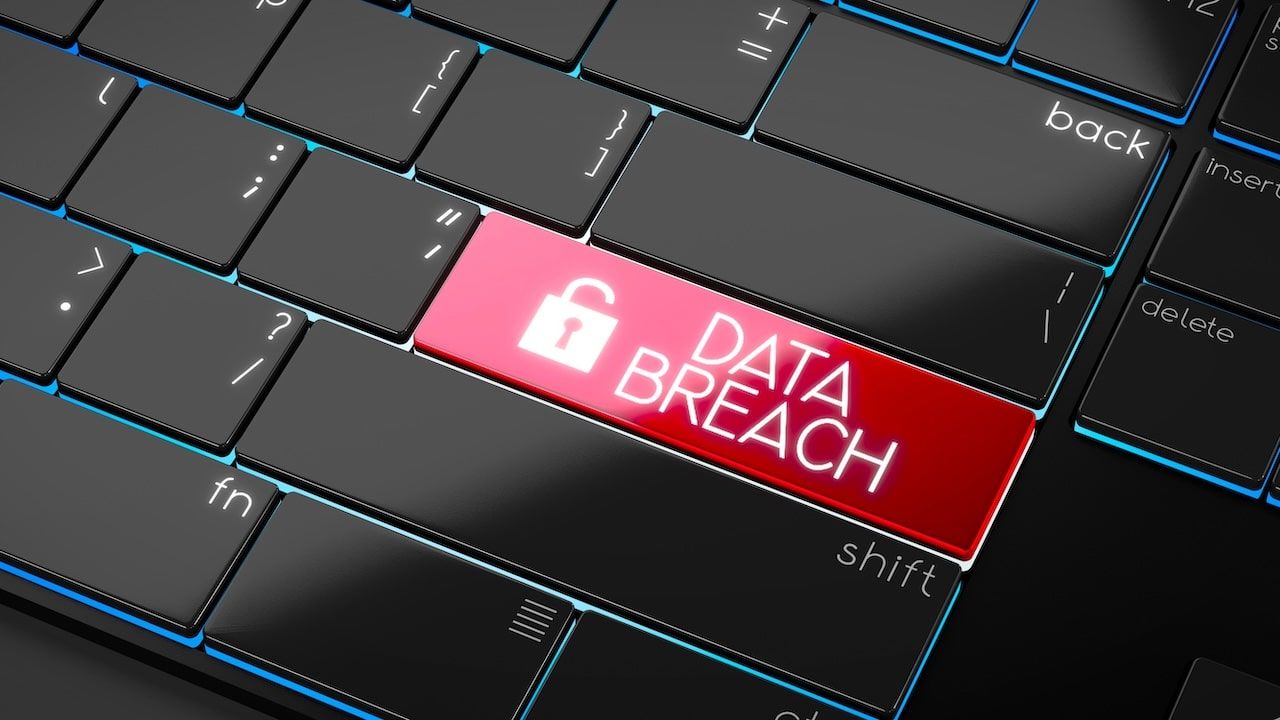 modern computer keyboard with Data Breach written on keys