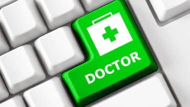 Color button on the keyboard with doctor suitcase image and doctor text. Online Health care concept.