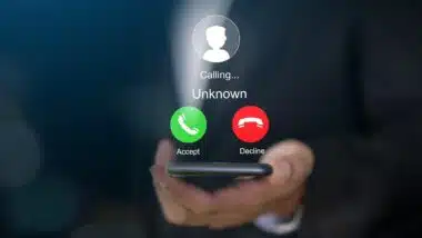 smartphone with incoming call from unknown number, spam