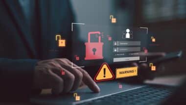 Cybersecurity warning on laptop login interface