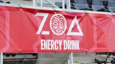A sign for ZOA, an energy drink