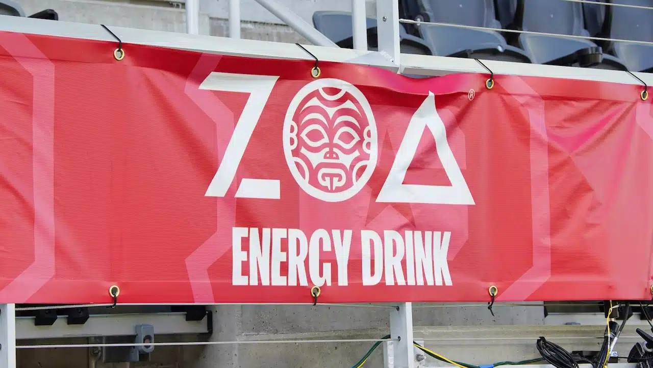 A sign for ZOA, an energy drink
