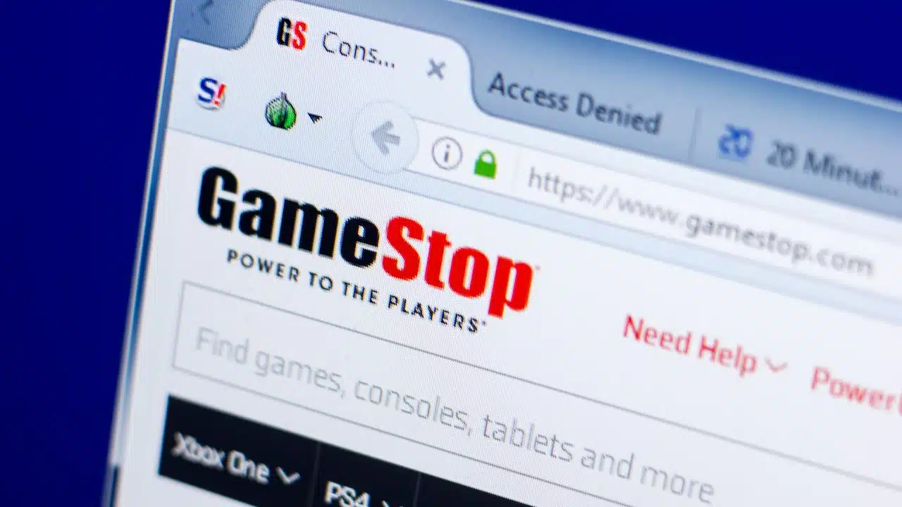 Homepage of GameStop website on the display of PC.
