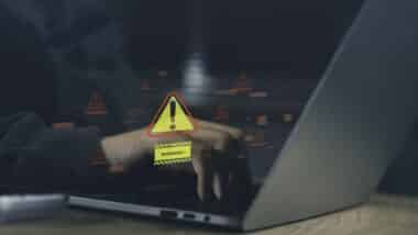 Cybersecurity warning and data breach alert concept