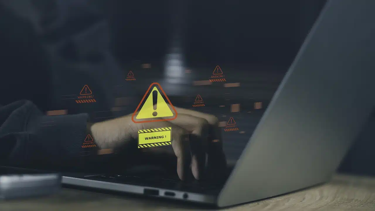 Cybersecurity warning and data breach alert concept