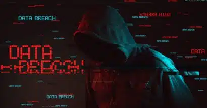 Data breach concept with faceless hooded male person, low key red and blue lit image and digital glitch effect