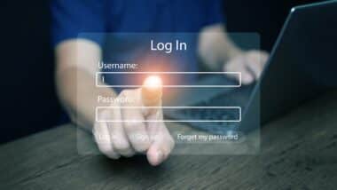 Finger pressing login button