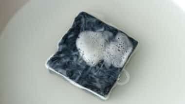 foamy soap in the soak with water,