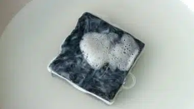 foamy soap in the soak with water,