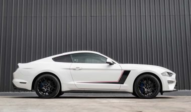 Side view of a white Ford Mustang, representing the Ford Mustang recall.