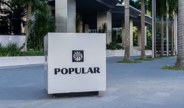 Banco Popular signage, representing Banco Popular overdraft class action settlement.