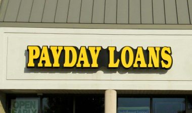 Close up of Payday Loans signage, representing tribal Payday loan class action.