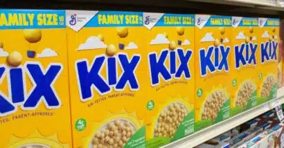 Kix cereal boxes on a supermarket shelf, representing Kix cereal settlement.