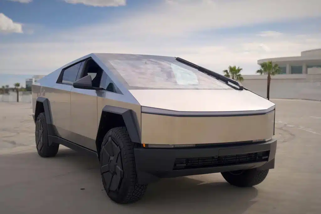 Exterior of a Tesla Cybertruck parked in an empty lot, representing the Tesla Cybertruck recall.