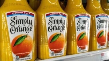 Simply Orange drink products for sale in a supermarket, representing Simply Orange PFAS class action lawsuit.