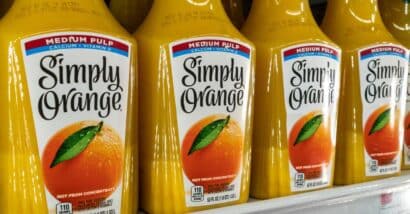 Simply Orange drink products for sale in a supermarket, representing Simply Orange PFAS class action lawsuit.