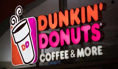 Close up of Dunkin Donuts signage, representing the Dunkin' class action.