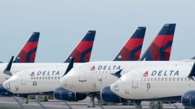 Delta Airlines aircrafts grounded at an airport, representing the Delta outage.