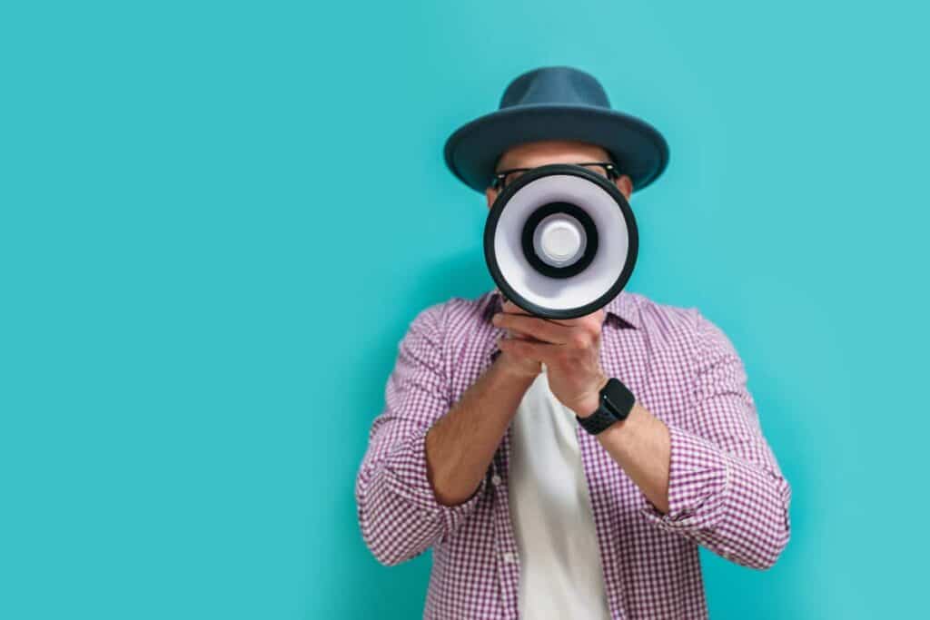 Close up of a guy using a megaphone, representing top recalls for the week of Aug. 5.
