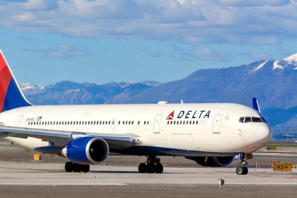 A Delta Airlines aircraft on a airport tarmac, representing the Delta flight outage.