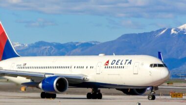 A Delta Airlines aircraft on a airport tarmac, representing the Delta flight outage.