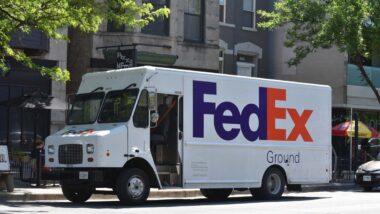 Fedex Delivery Truck parked on side of the road, representing the FedEx class action.