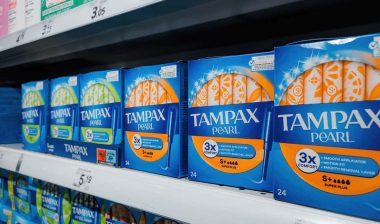 Tampax products on a supermarket shelf, representing the Tampax lead class action.