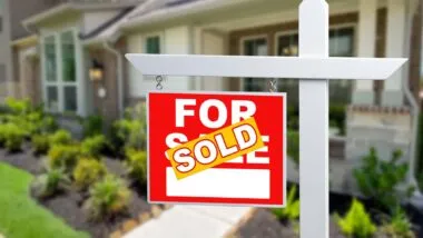 Sold sticker over a for sale sign, representing the NAR and HomeServices settlements.