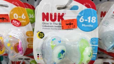 Close up of Nuk pacifier products on display in a store, representing the Nuk pacifier class action.