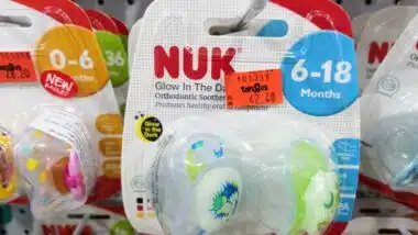 Close up of Nuk pacifier products on display in a store, representing the Nuk pacifier class action.