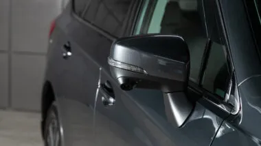 Close of Subaru side mirror representing the Subaru class action.