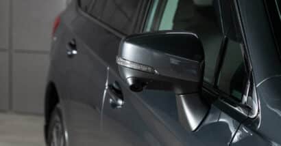 Close of Subaru side mirror representing the Subaru class action.
