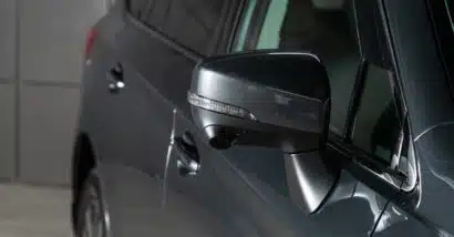 Close of Subaru side mirror representing the Subaru class action.