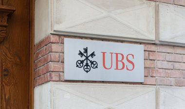 UBS Financial sign on brick building representing the UBS Financial class action.